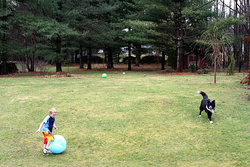 Malachi-playing-in-garden-2.jpg